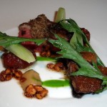 Breast of Duck and Leg Confit, hazelnut praline and celtuce, dates with wild fennel